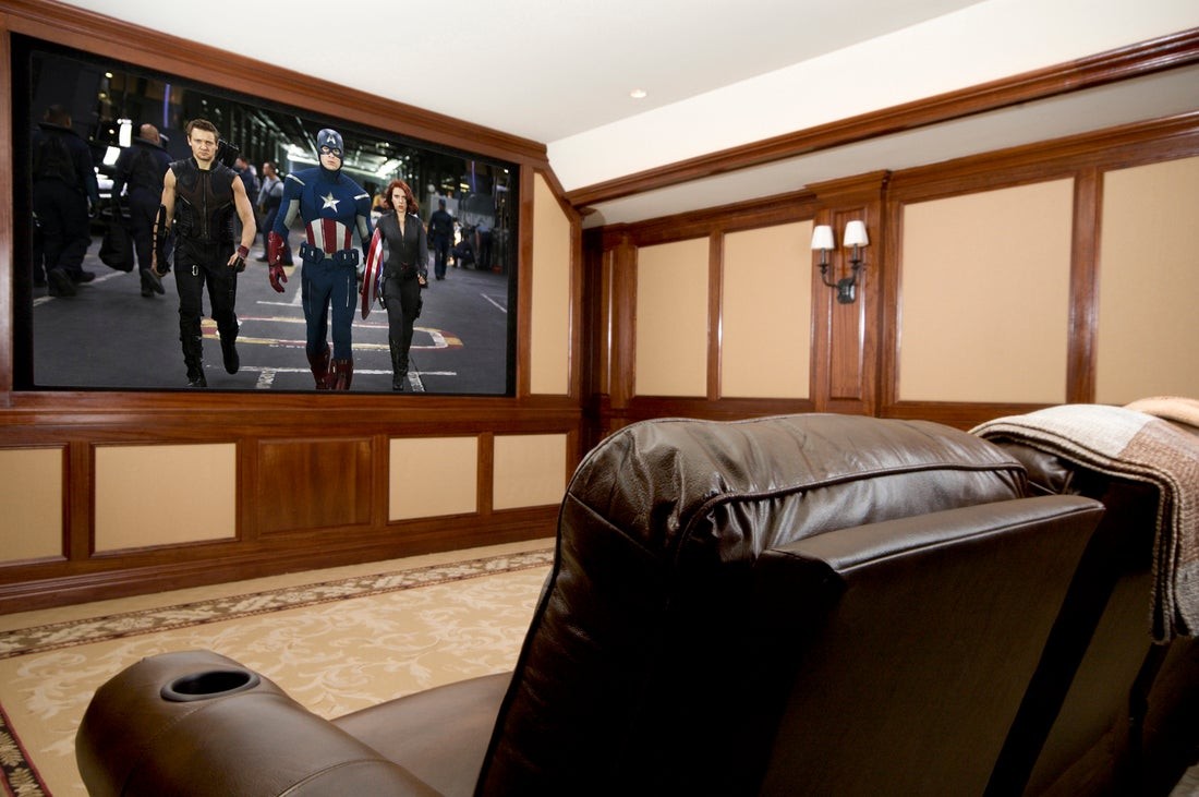 A home theater featuring a video display implemented by a professional audiovisual company.