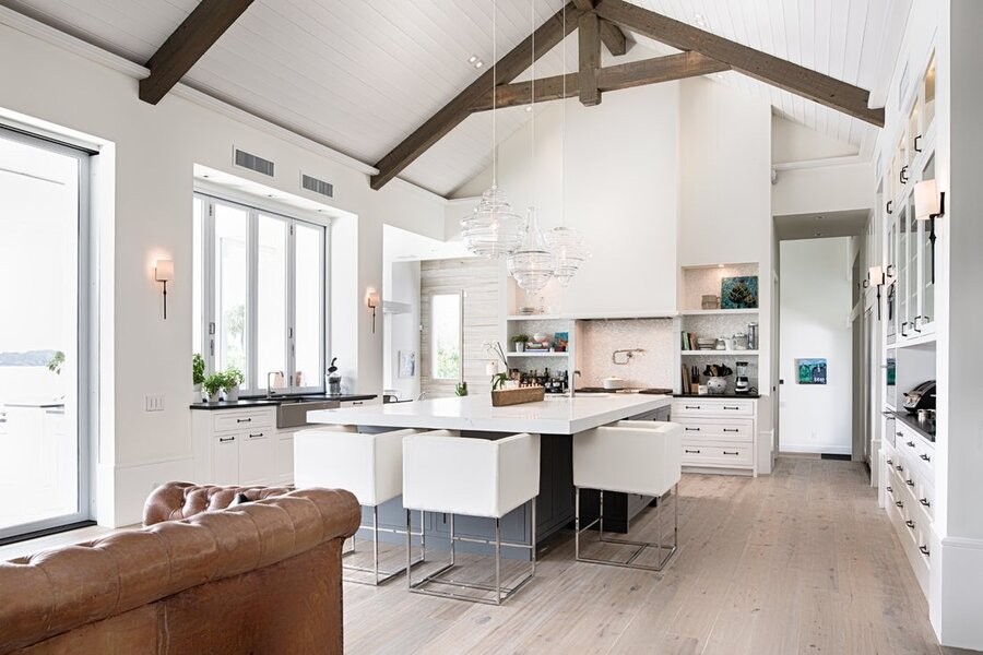 A kitchen living space brightened by lighting control fixtures.