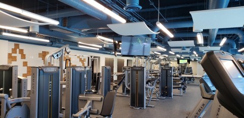A gym with an audio-video system. 